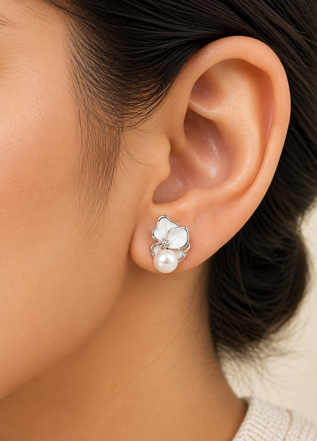 Model wearing Pearl Petal Stud Earrings in Silver