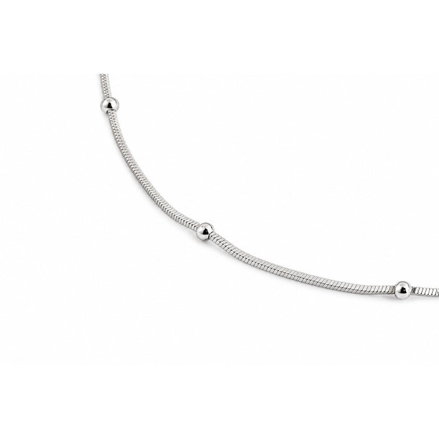Close-up of the Lumi Orbit Silver Beaded Anklet