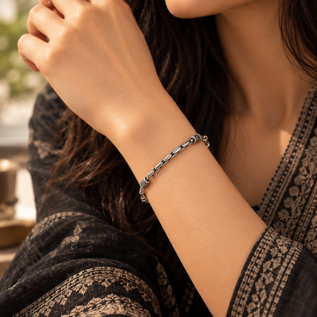 Model wearing Oxidised Silver Link Bracelet