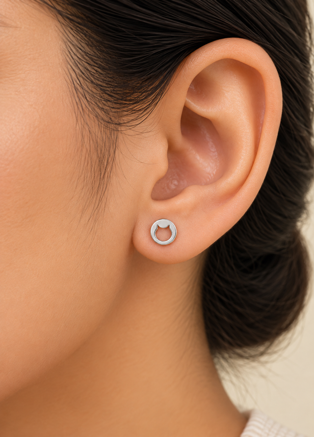 Model wearing Cat Silhouette Rhodium Stud Earrings