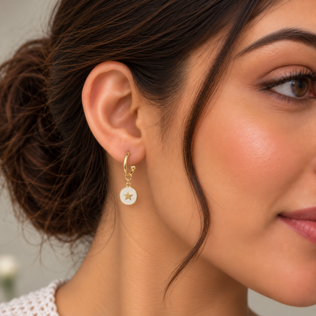 Model wearing Star Charm Enamel Hoop Earrings