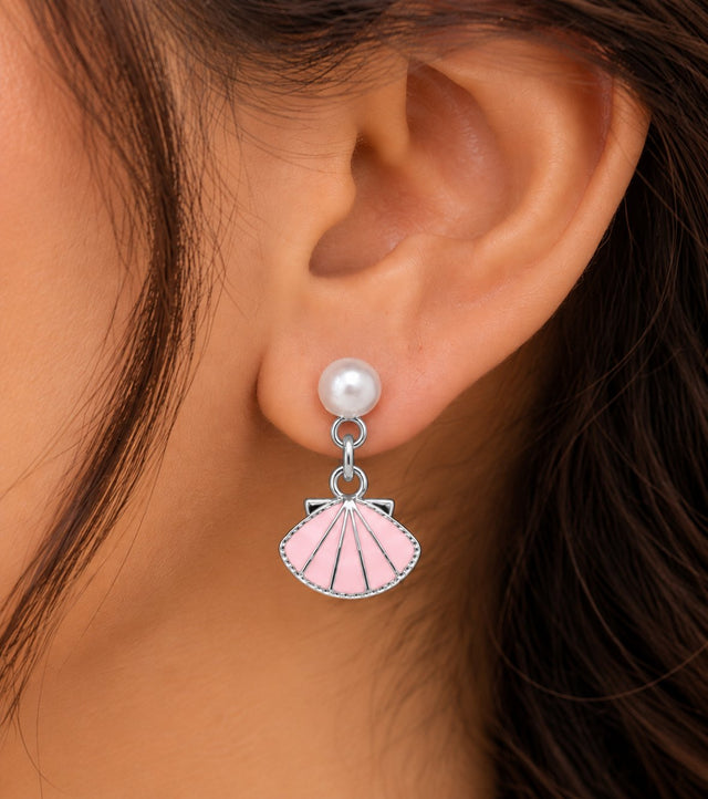Close-up of the pink enamel shell fan drop earring with a pearl