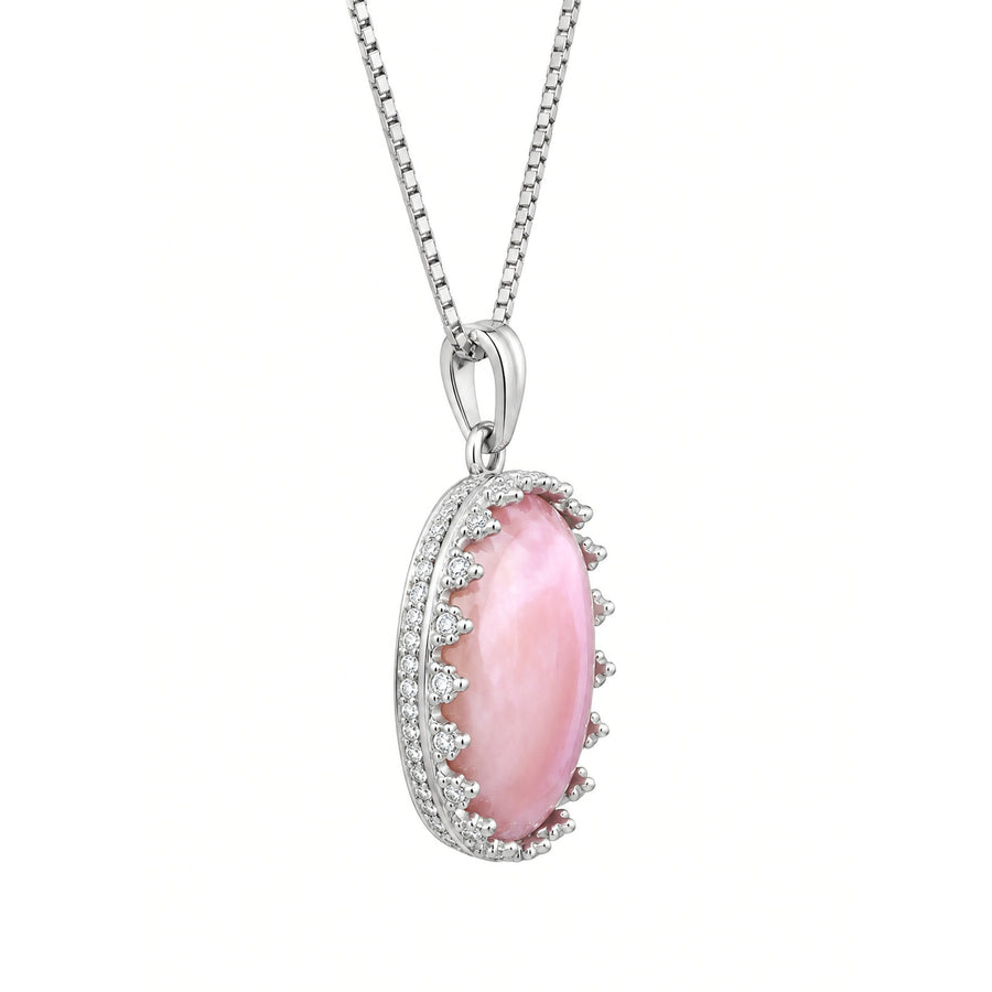Side view of the Queen Conch shell pendant in its silver-tone setting