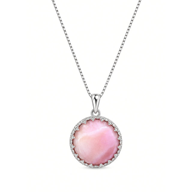 Close-up of the pink Queen Conch shell pendant on a silver chain