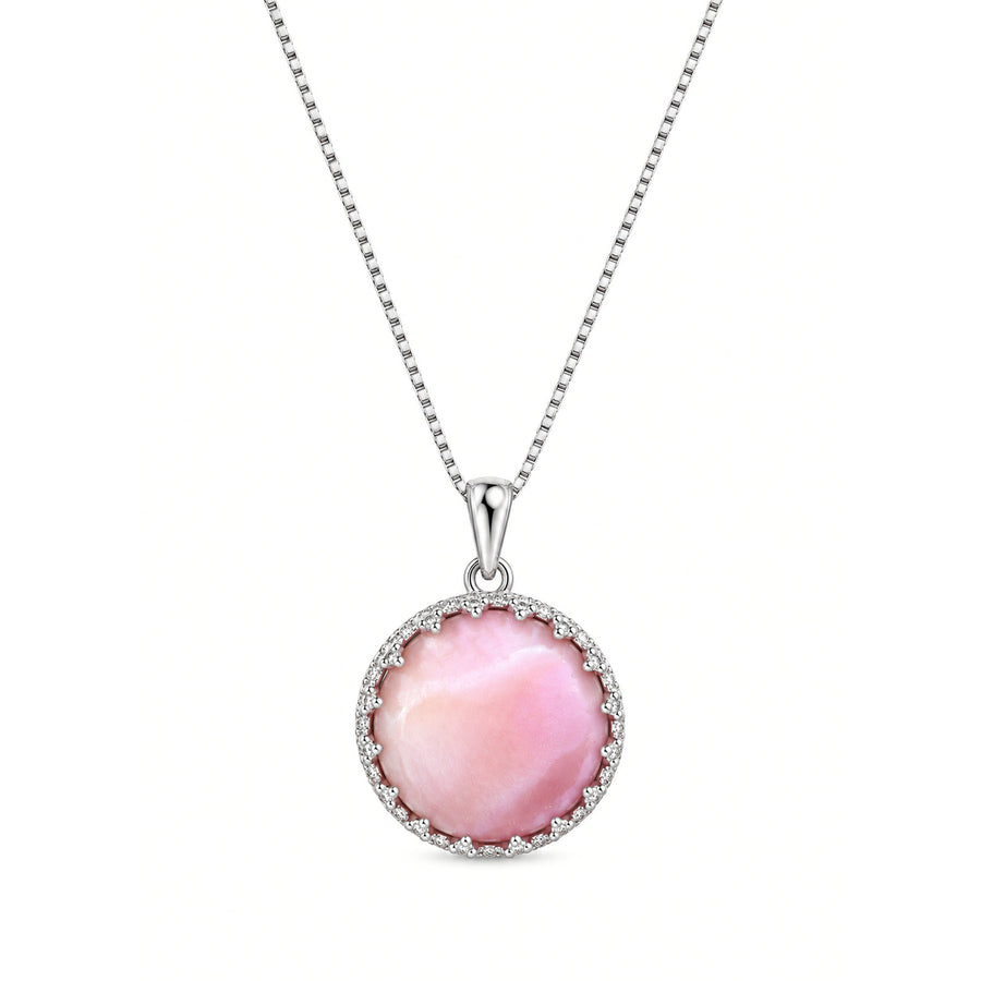 Close-up of the pink Queen Conch shell pendant on a silver chain
