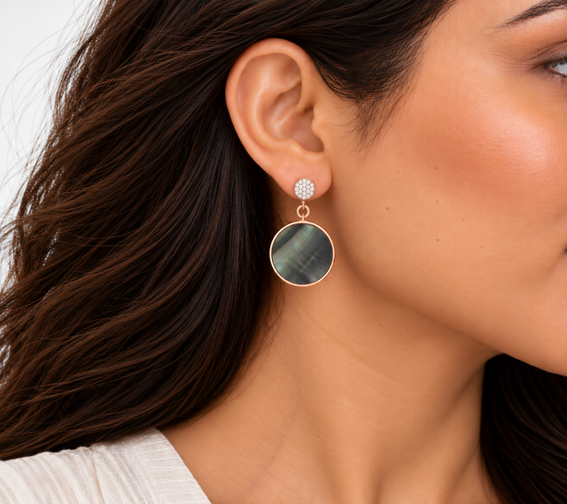 Model wearing Luna Iridescent Disc Earrings