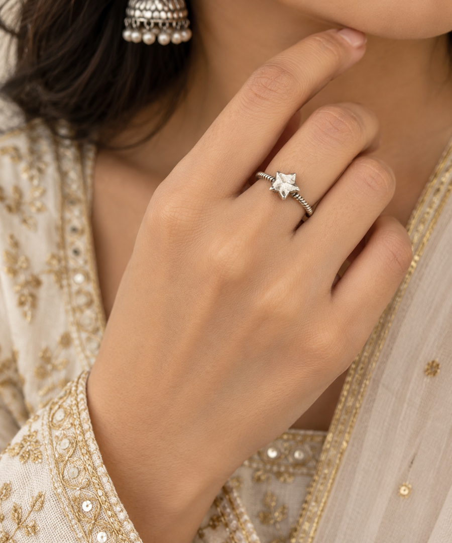 Model wearing Oxidised Silver Star Ring