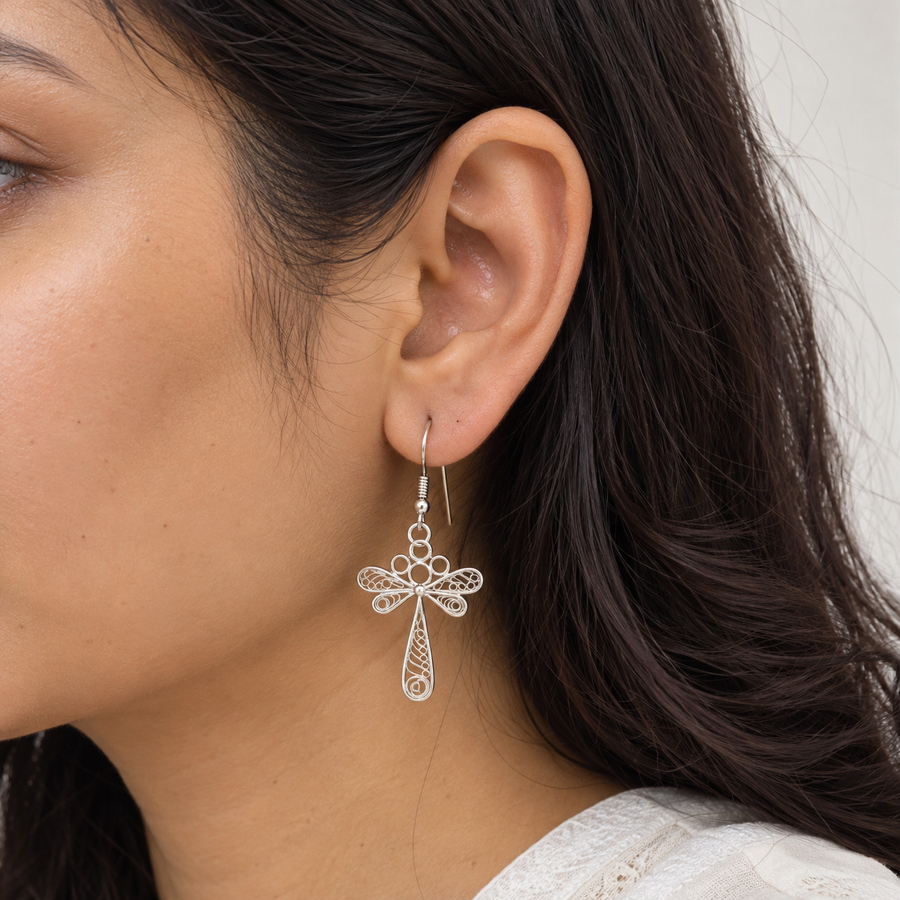 Model wearing Handcrafted Filigree Dragonfly Earrings