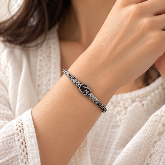 Model wearing Italian Woven-Knot Silver Bracelet