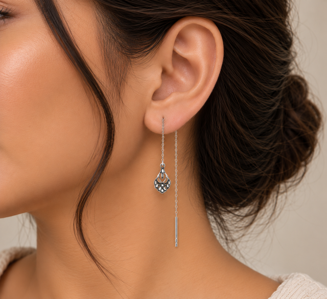 Model wearing Sui Dhaga Oxidised Drop Earrings