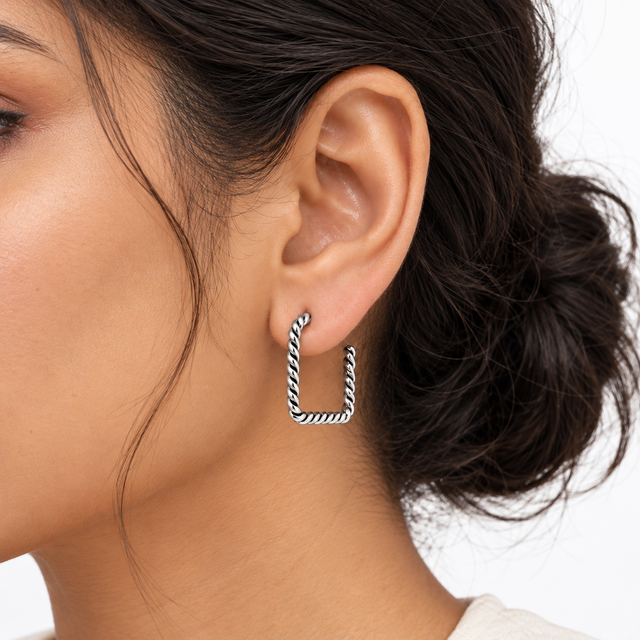 Model wearing Twisted Rope Square Hoop Earrings