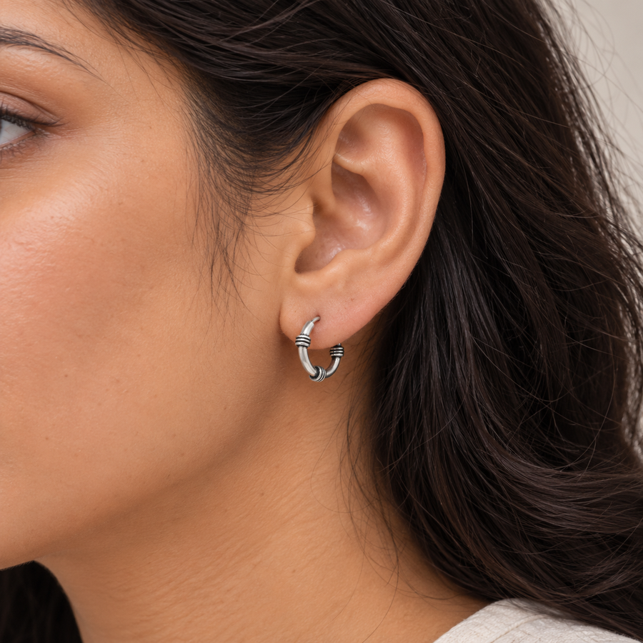 Model wearing Mini Oxidised Ridged Hoop Earrings