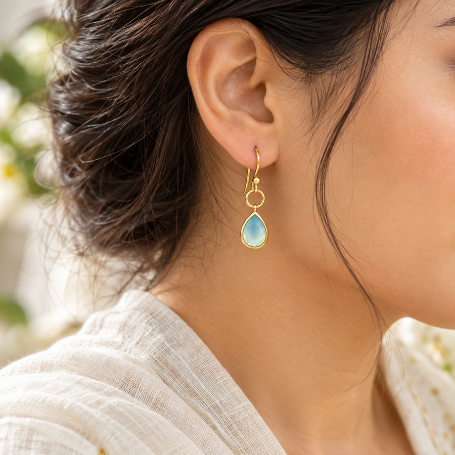 Model wearing Aqua Teardrop Charm Earrings