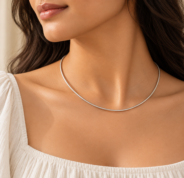 Model wearing Silver Grace Torque Necklace
