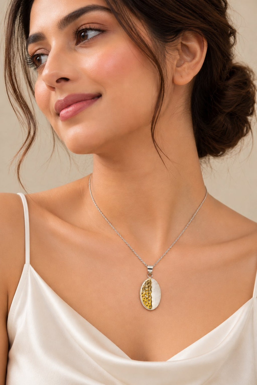 Model wearing Textured Two-Tone Oval Pendant
