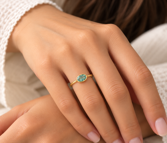 Model wearing Emerald Glow Ring