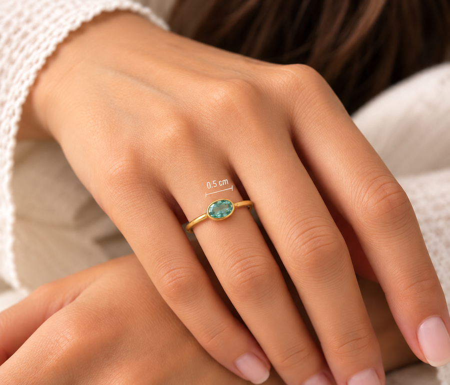 Model wearing Emerald Dewdrop Ring