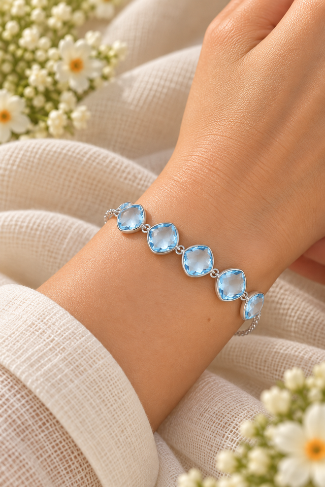 Model wearing Sky Blue Topaz Bracelet