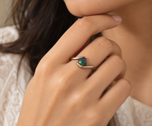Model wearing Ethiopian Opal Wave Ring