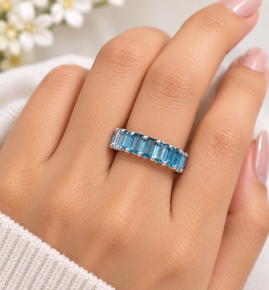 Model wearing Sky Blue Topaz Spectrum Band